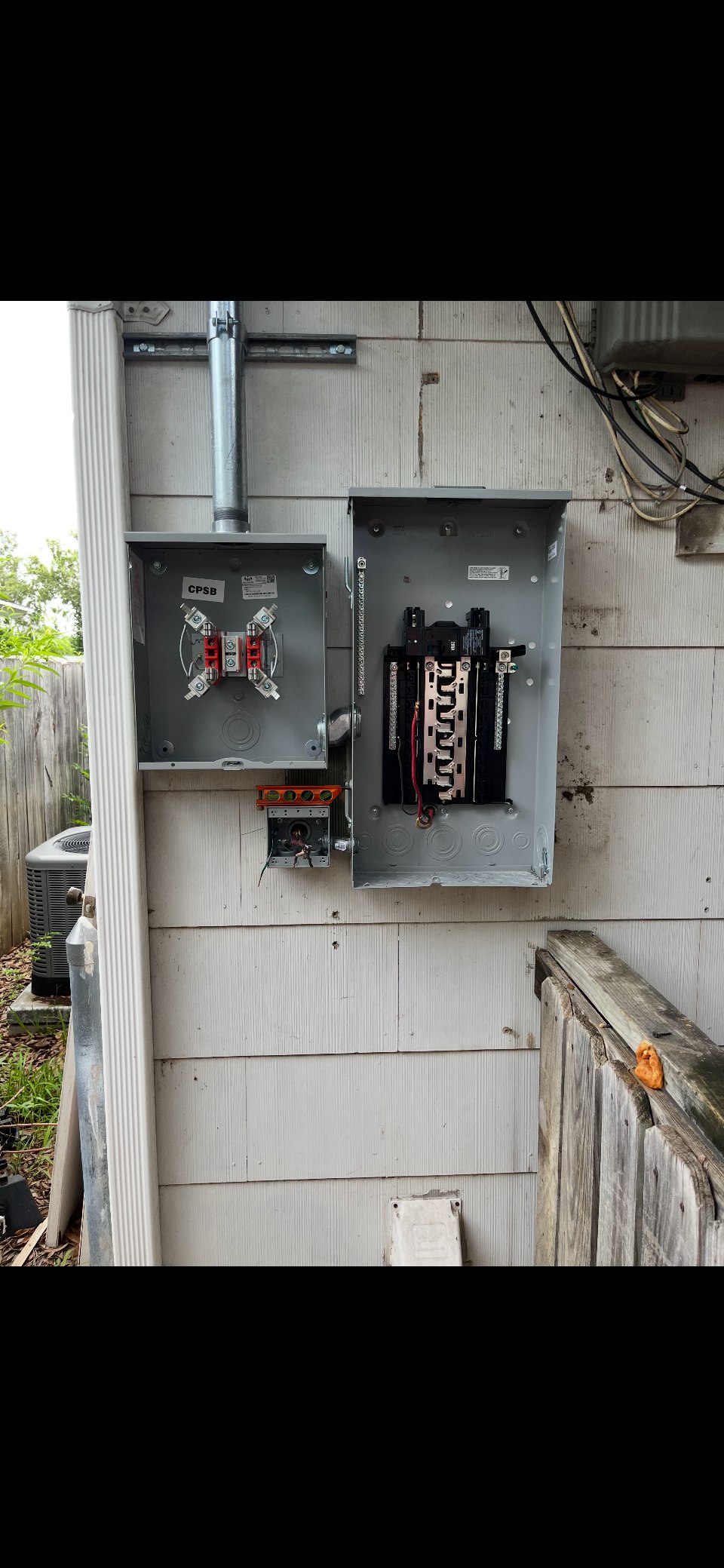 Dual electrical panel setup with capacity for EV charger and home electrical needs