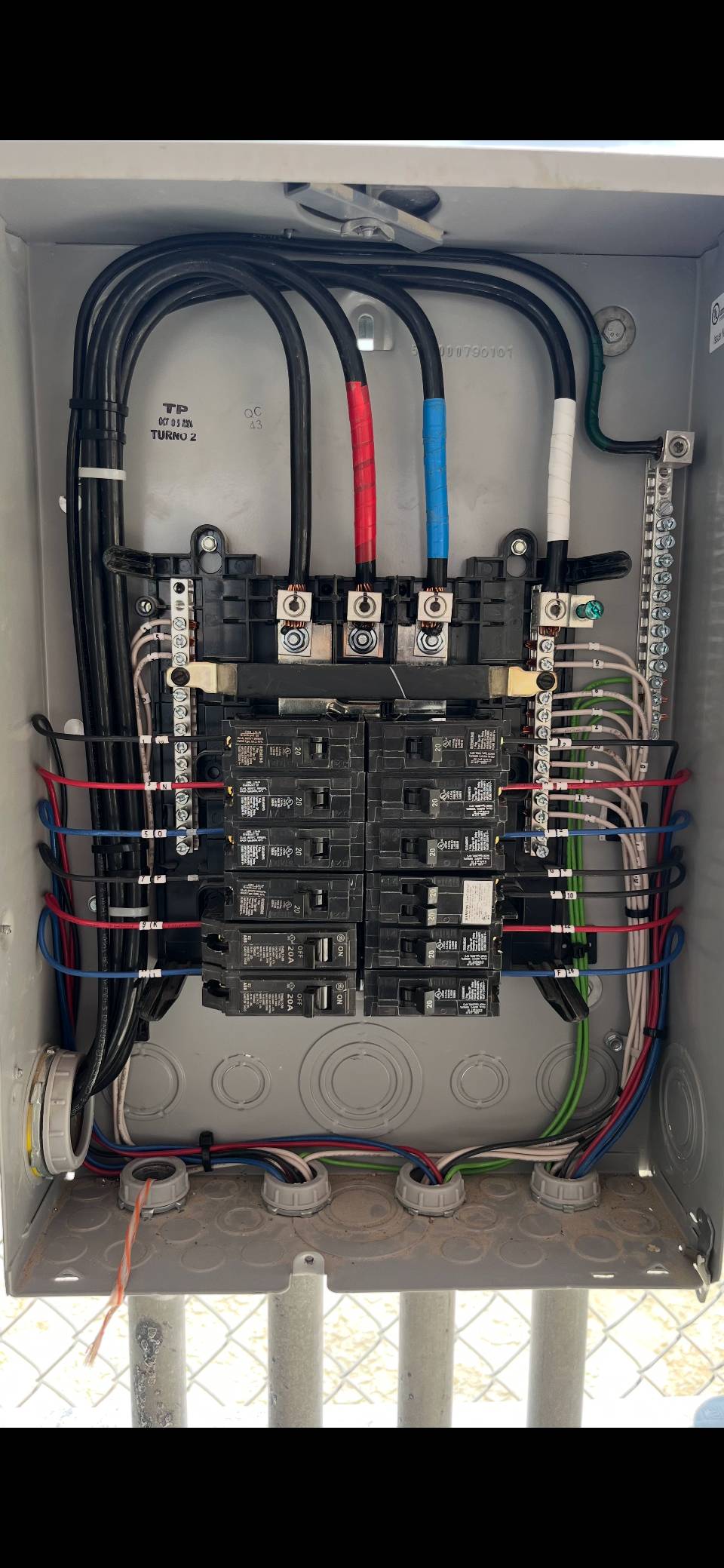 Modern electrical panel with excellent cable management and color-coded wiring system